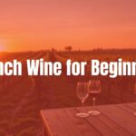 A rustic French vineyard at sunset, rows of grapevines stretching into the distance, a wooden barrel and wine glasses on a weathered table, warm golden light, realistic.